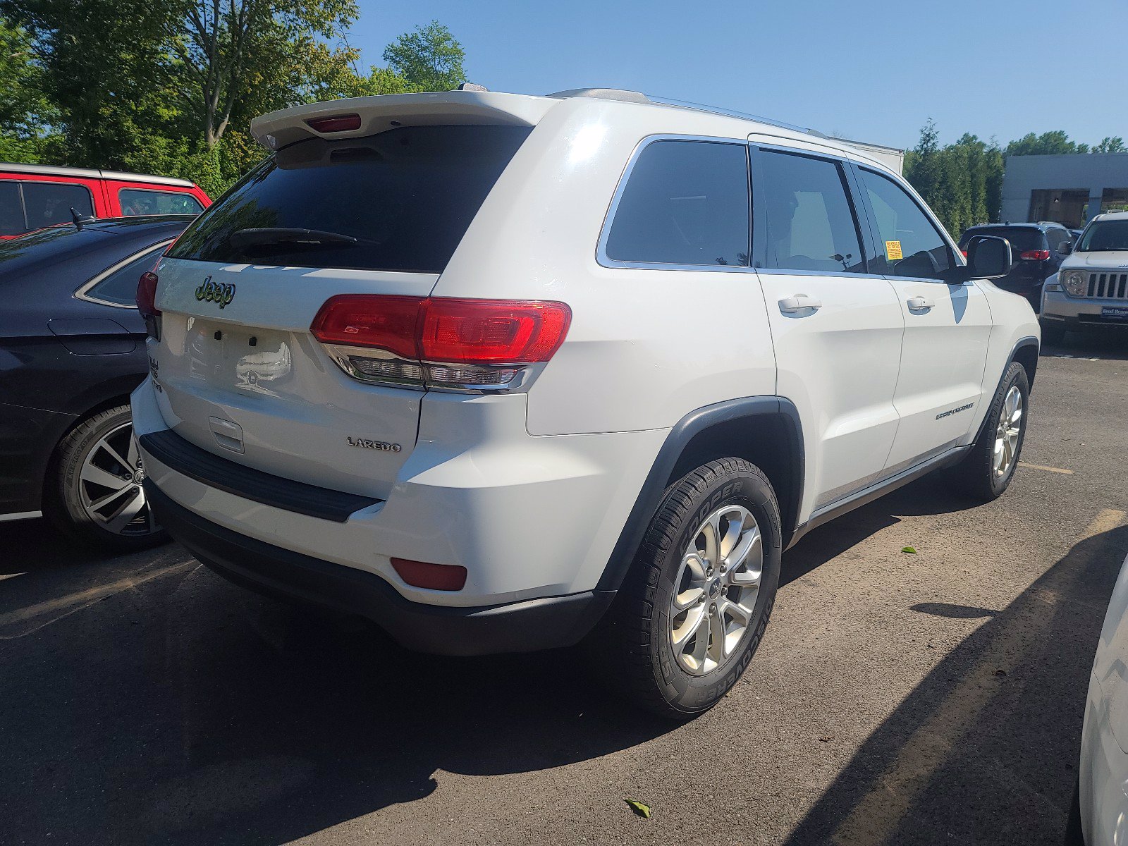 Pre-Owned 2015 Jeep Grand Cherokee Laredo 4WD Sport Utility