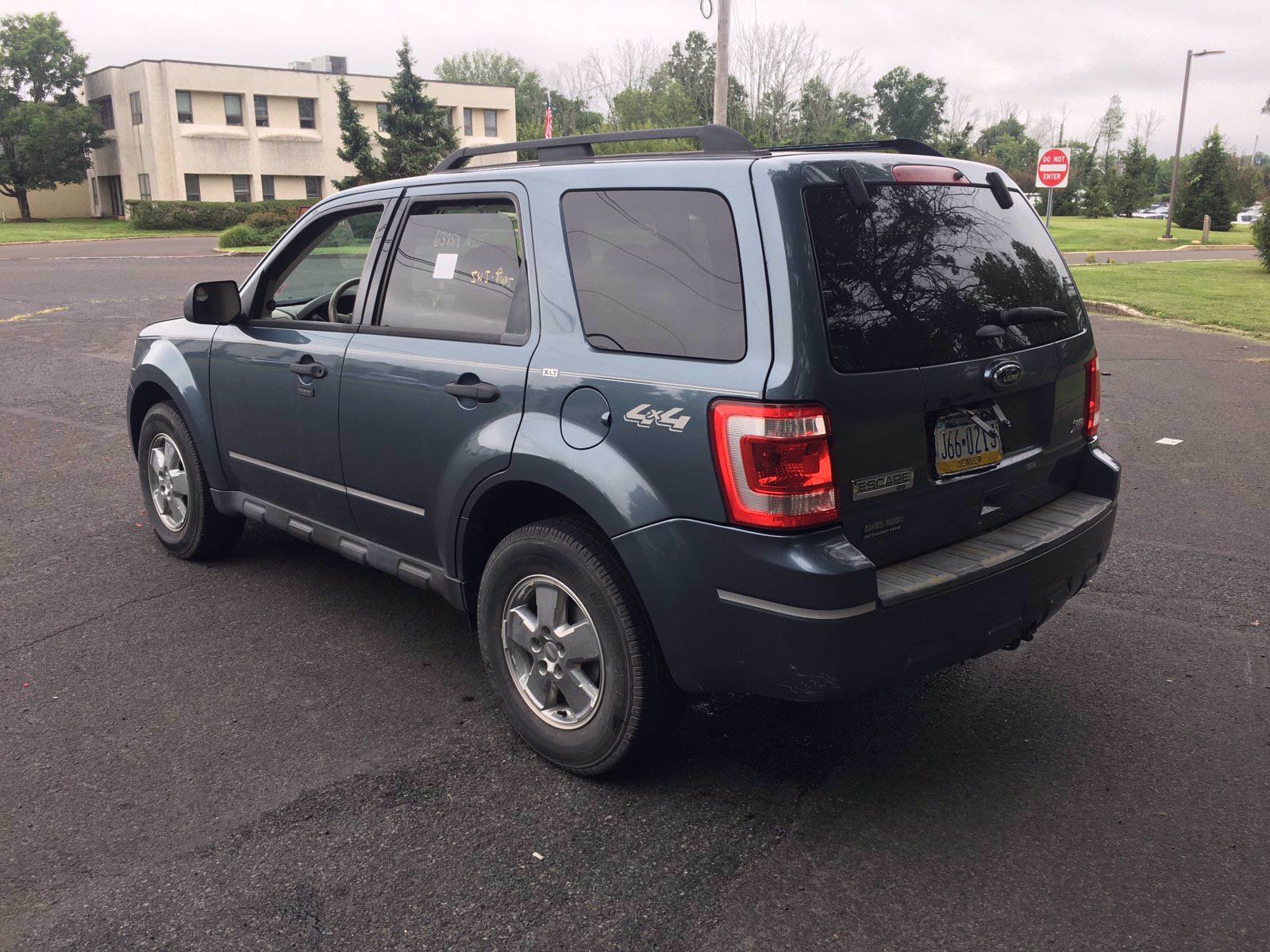 Pre-Owned 2011 Ford Escape XLT 4WD Sport Utility