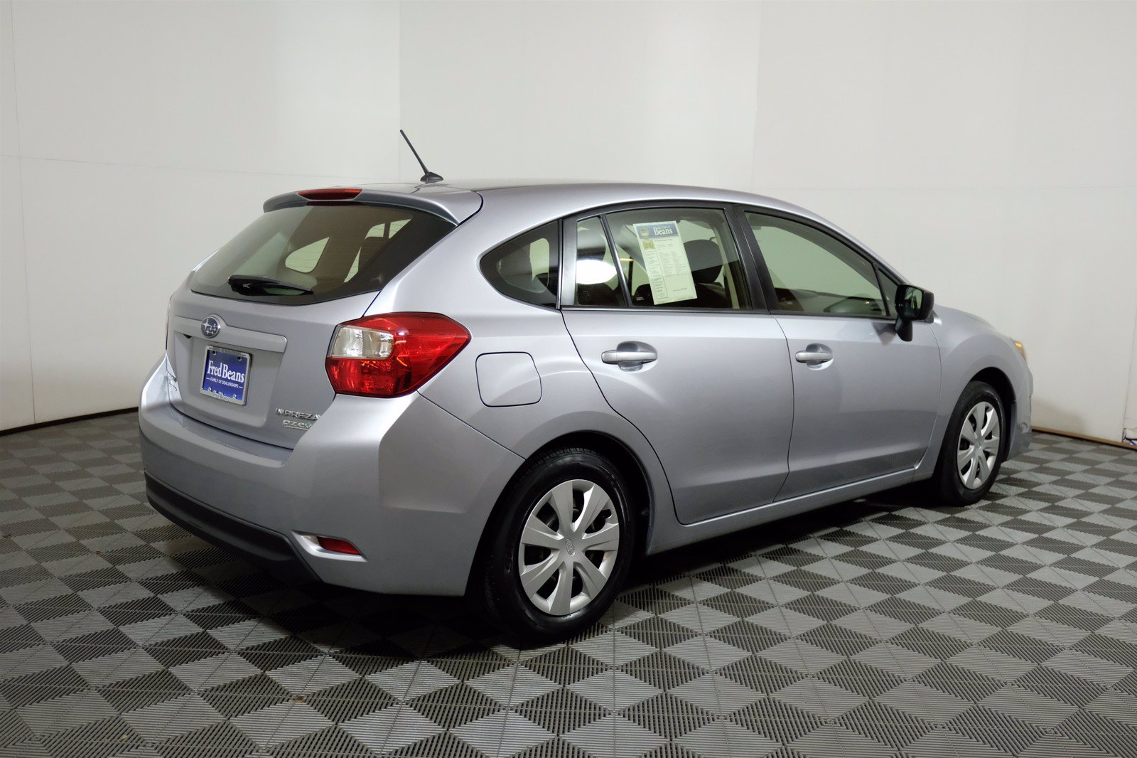 PreOwned 2016 Subaru Impreza Wagon 2.0i AWD Hatchback